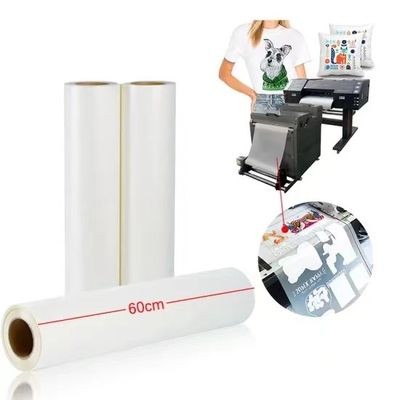30cm*100m پاره کردن کاغذ انتقال DTF گرم 75mic با انعطاف پذیری برای پوست سرد / گرم